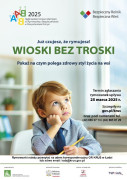 Kolorowy plakat - widoczny zamyślony chłopiec trzymający w ręku ołówek 