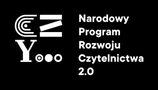 Czarny baner, na którym widać białe litery