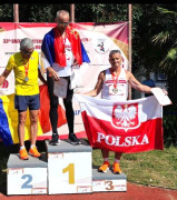 Trzej zawodnicy na podium. Pierwszy z prawej - Piotr Płoskoński 