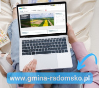 Grafika - kobieta trzyma komputer
